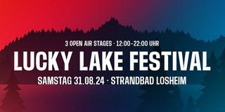Der Schriftzug "Lucky Lake Festival" steht groß vor einem rot-blauen Hintergrund. (Foto: Lucky Lake Festival)
